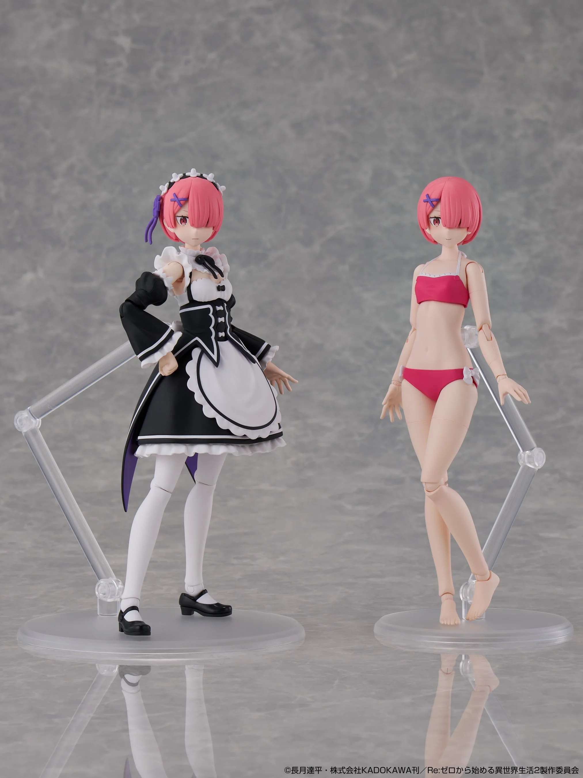 ラムDX版のメイド服本体とピンクの水着本体を並べた塗装済み試作品